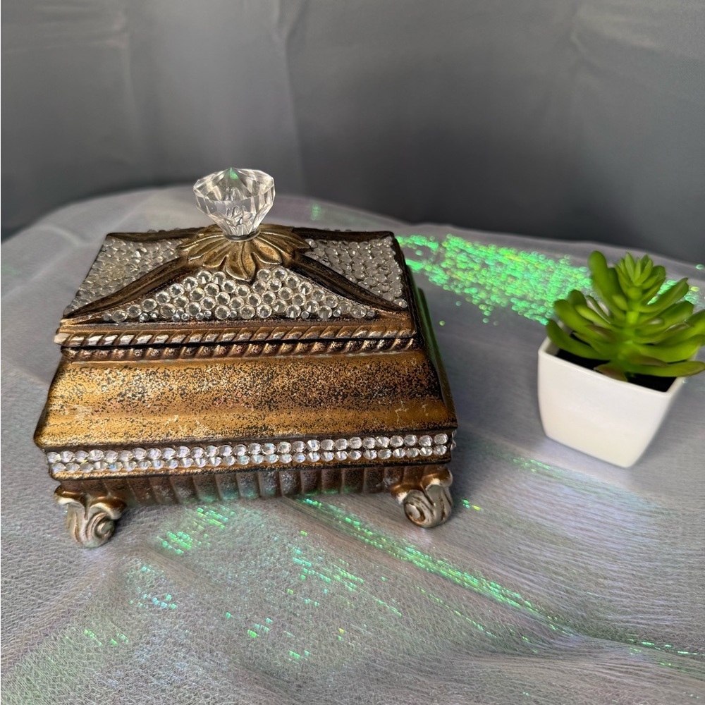Elegant Gold and Silver Jewelry Box with Crystal Knob